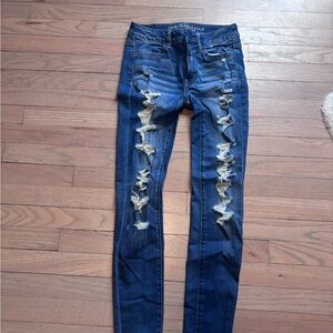 American Eagle Outfitters Women's Distressed Blue super skinny Jeggings